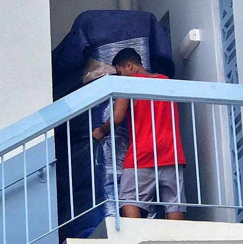 Moving big heavy couch upstairs to 4th floor.